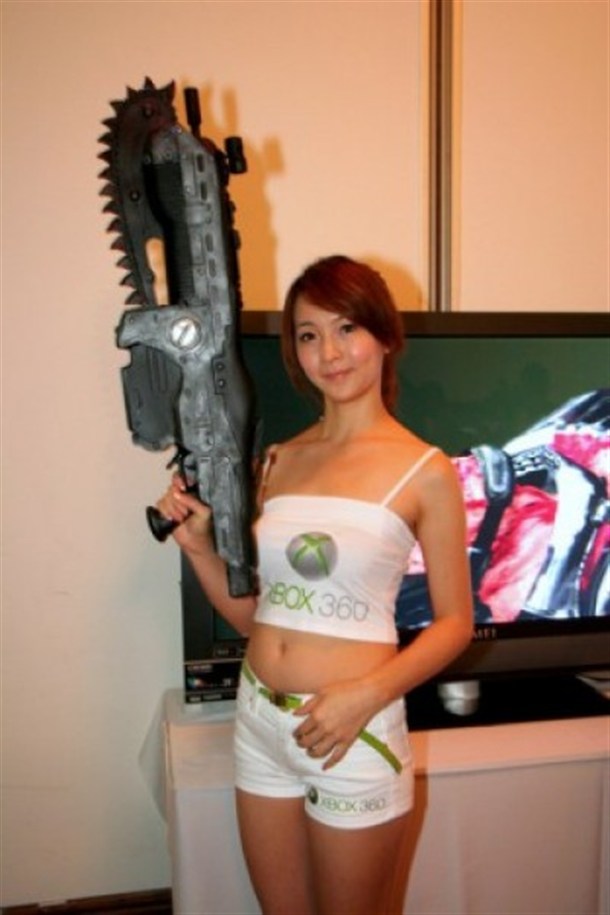 Booth Babe WIth Chainsaw