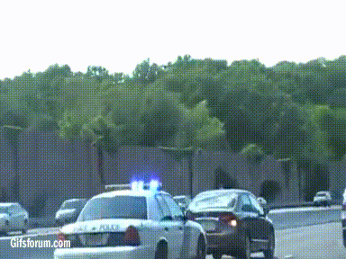 State Trooper trolling a slow driver on the highway